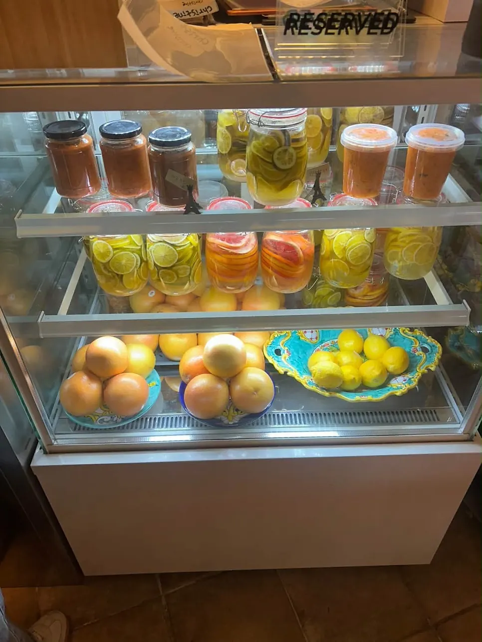 Restaurant refrigerator with house-made fruit syrups