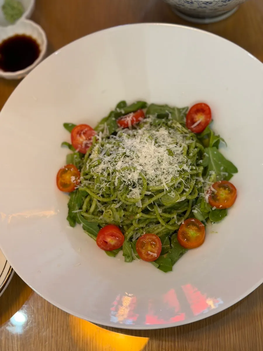 Fragrant basil oil pasta close-up