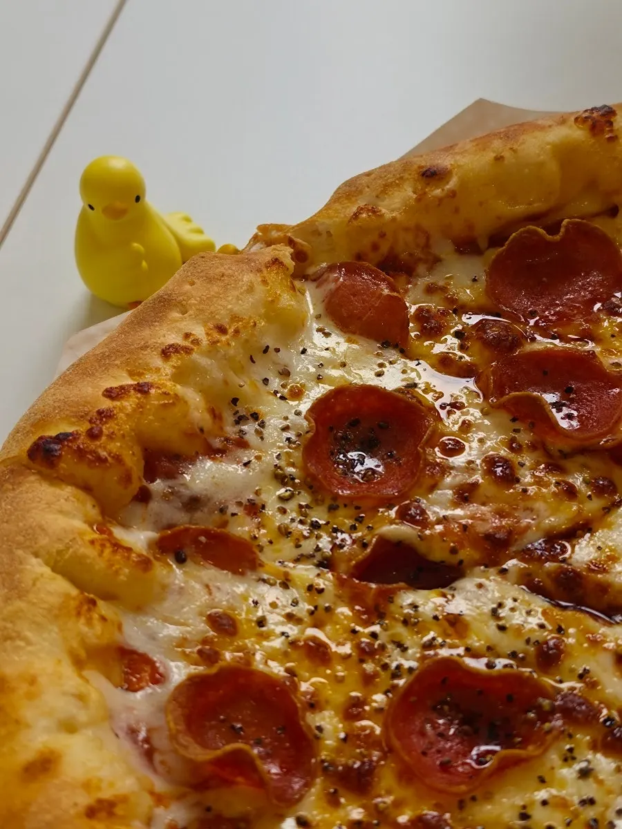 A full cheese-crust pizza spread