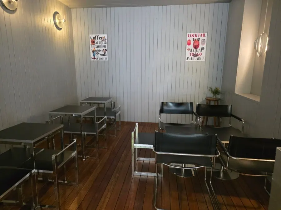 Seating in an inner room of Pip Espresso Bar