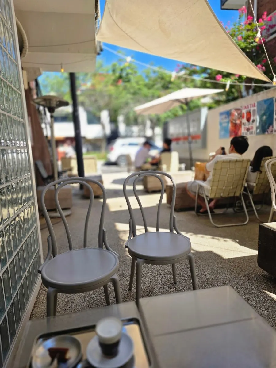 Outdoor table seating at Pip Espresso Bar