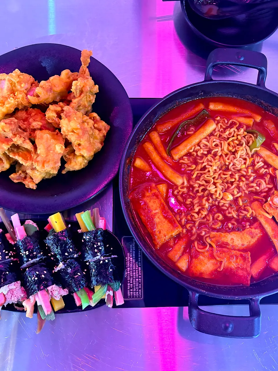 Menu board of tteokbokki and side dishes at Eungkeum Tteokbokki Yeonnam Branch