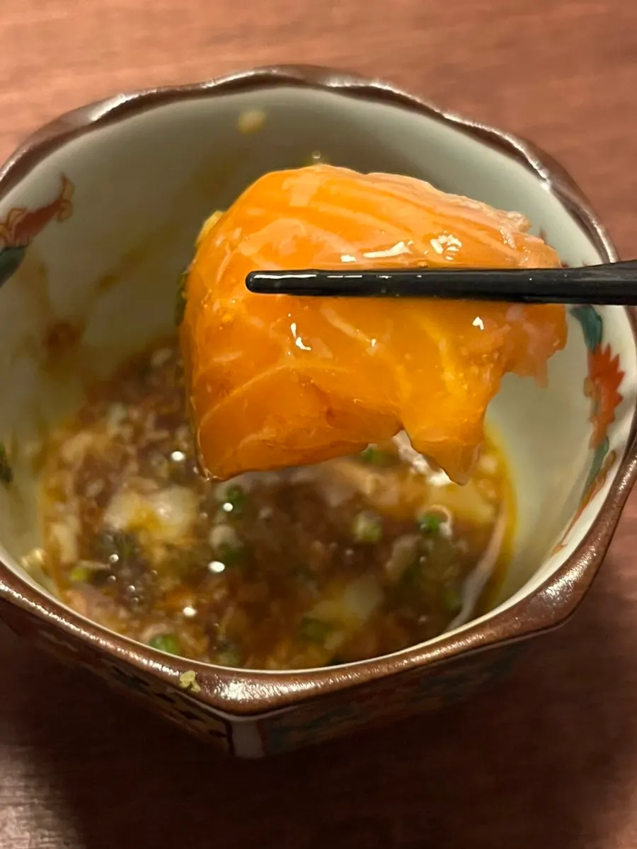 Onsen tamago served with sauce