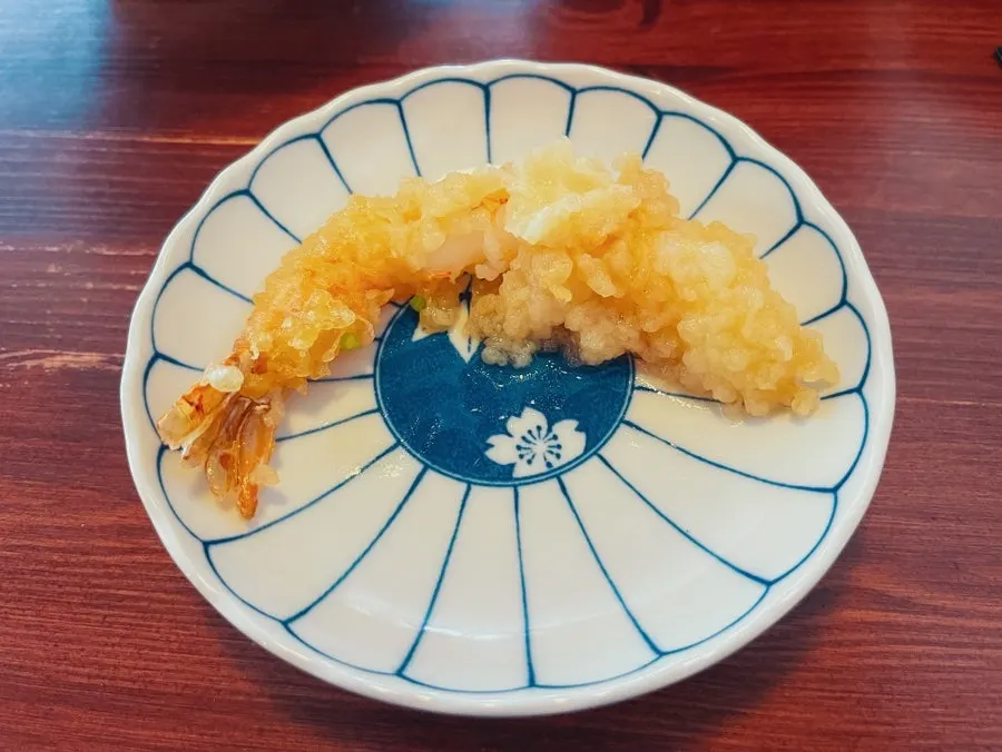 Ebi tempura udon topped with two pieces of shrimp tempura