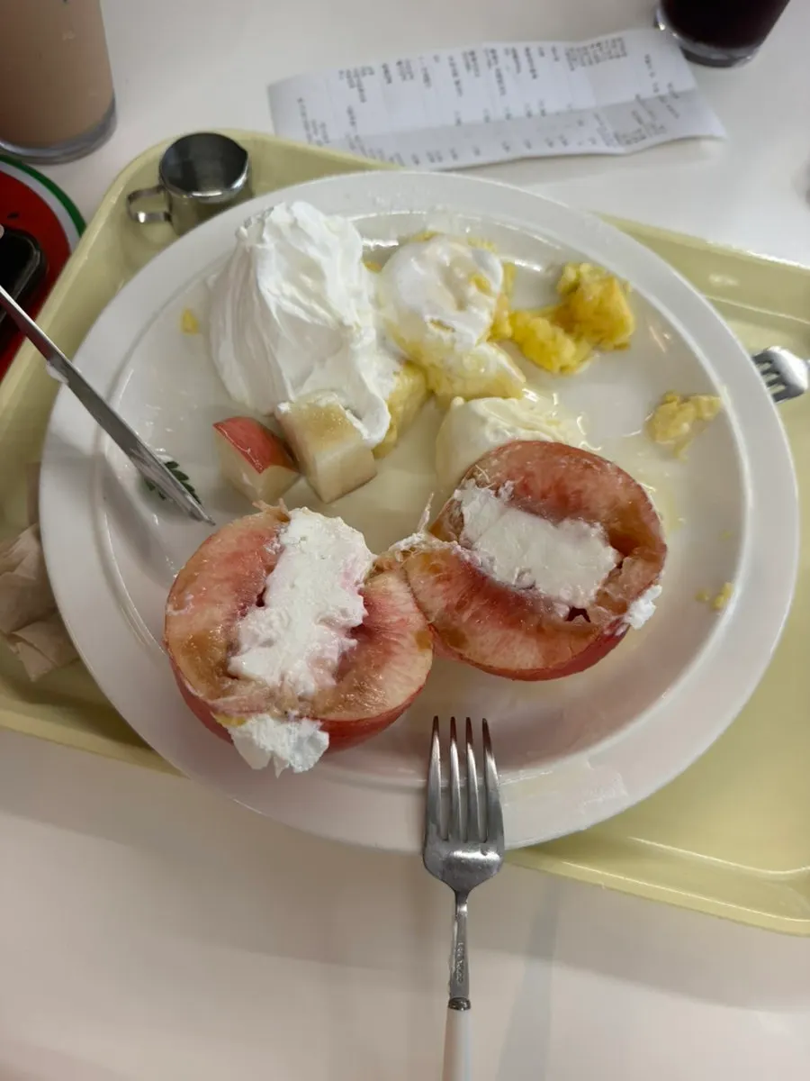 Peach soufflé drizzled with syrup
