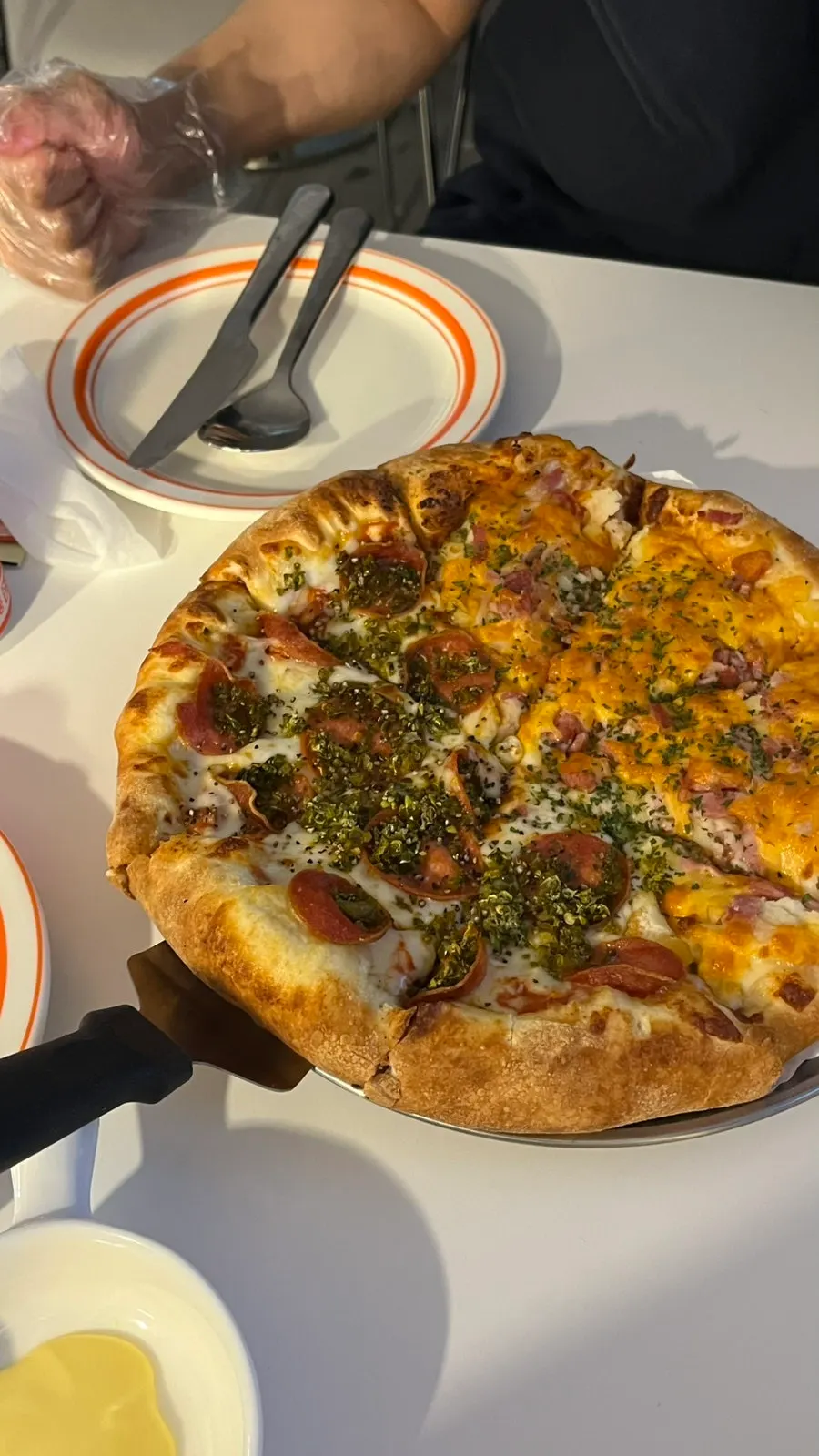 Spicy pepperoni and combination half-and-half pizza