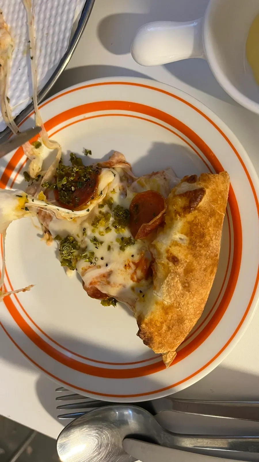 Spicy pepperoni pizza slice