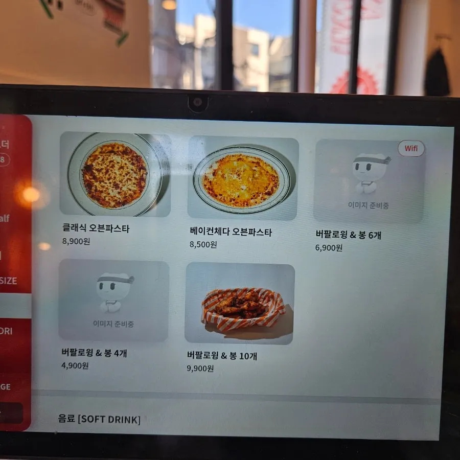 Table at Sunny's Pizza Market with the pepperoni pizza order placed