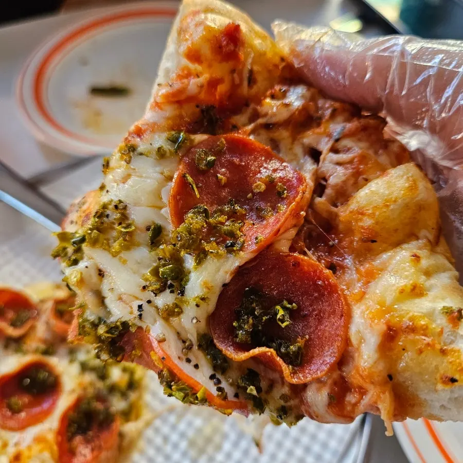 Table set with pizza and wings together