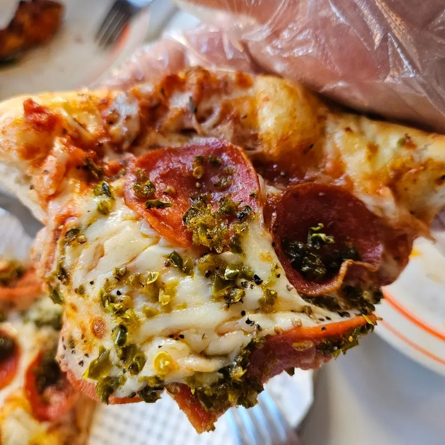 Pepperoni pizza generously topped with ingredients