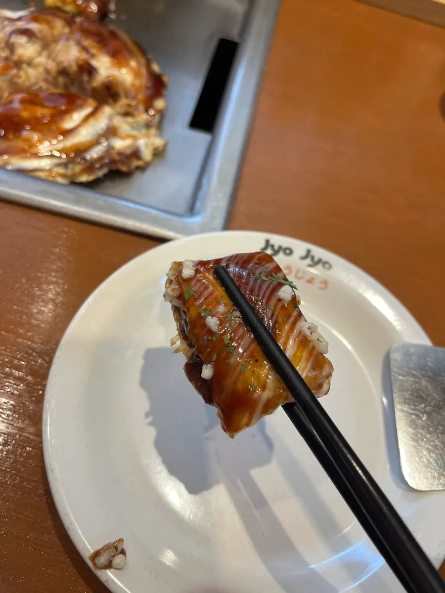 Okonomiyaki and yakisoba on the grill