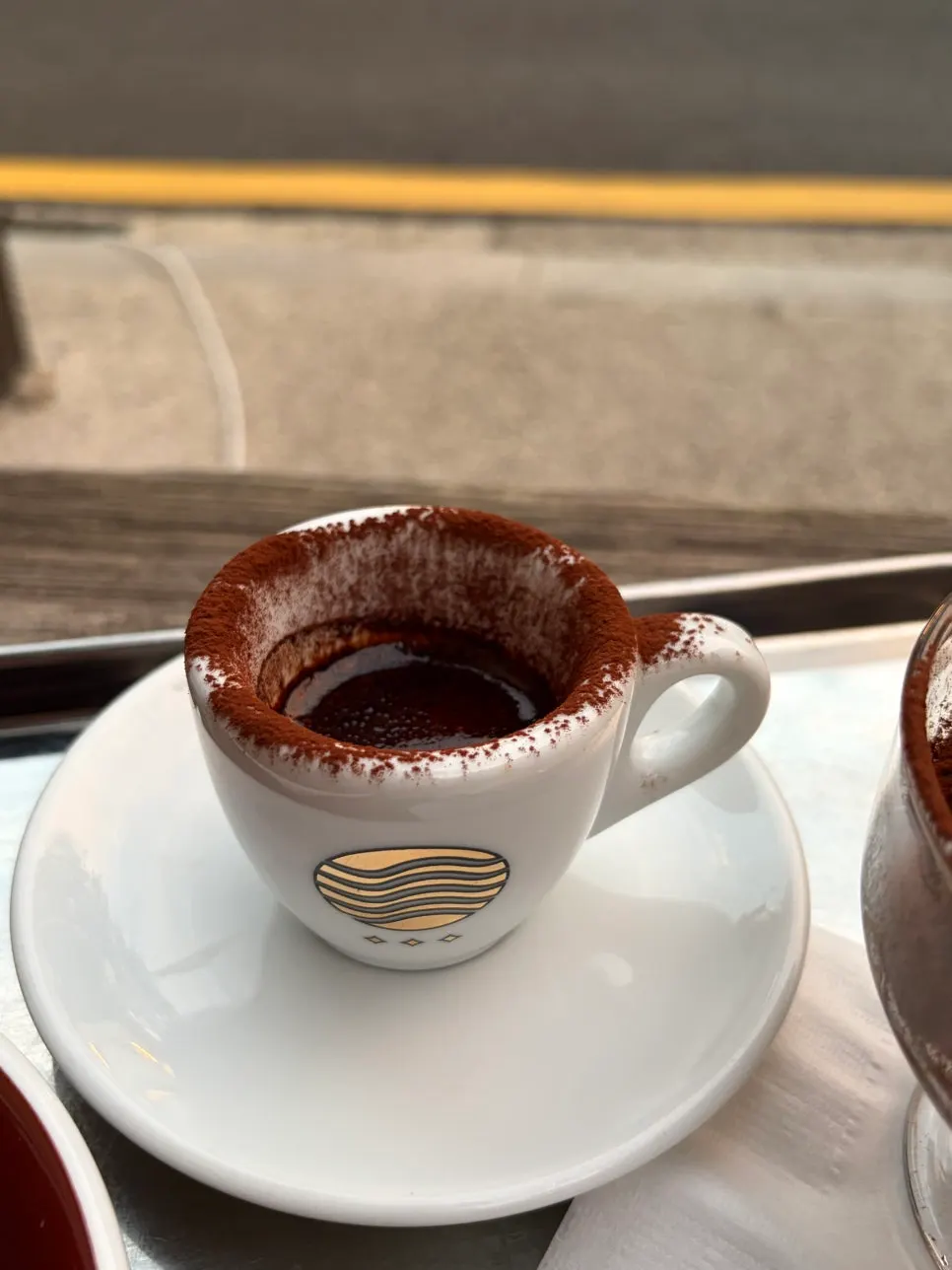 A strapazzato topped with cocoa powder