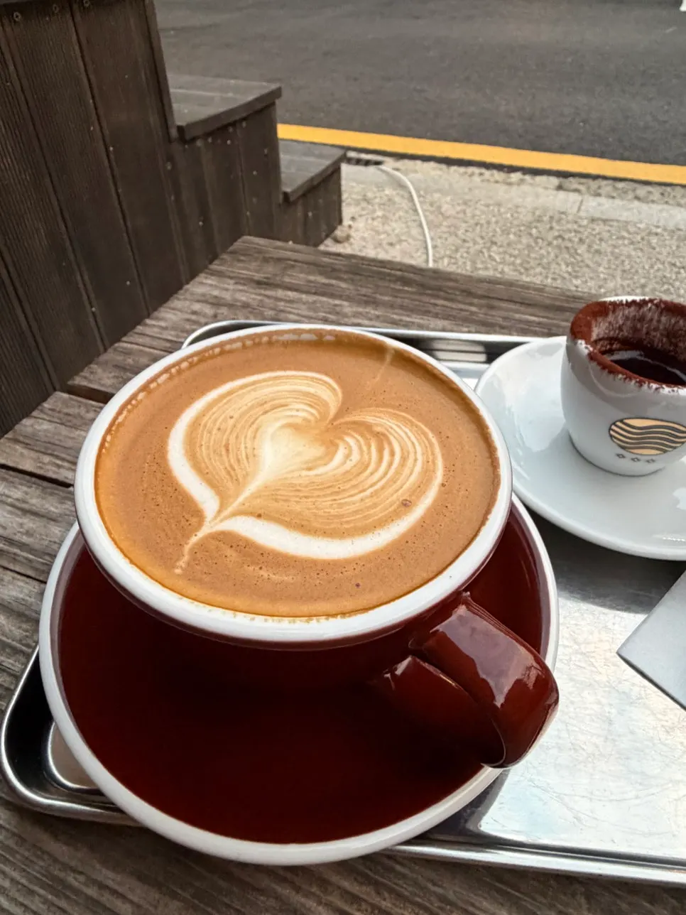 A café latte ordered with oat milk