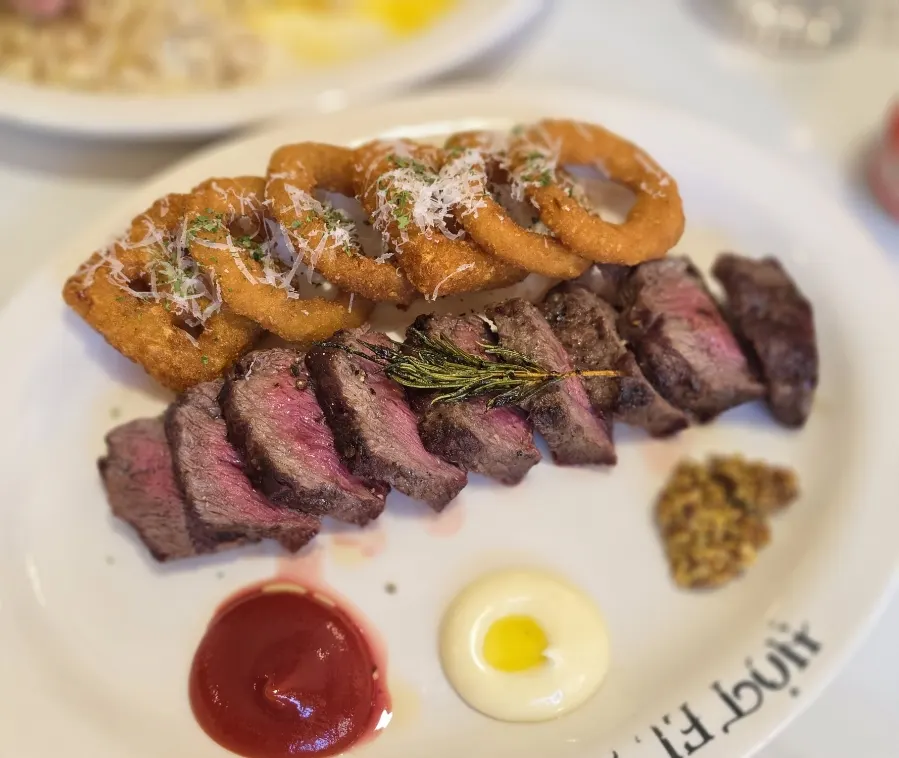 Cross-section of the steak, seared golden on the outside