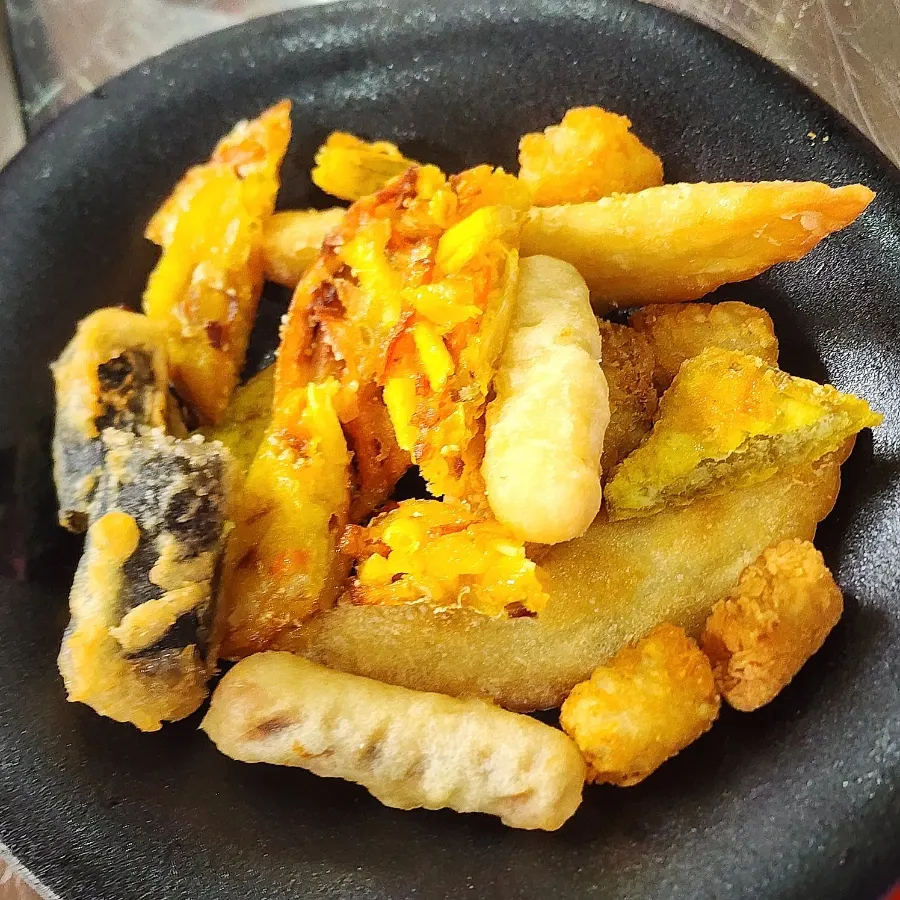 Fried assortment dipped in tteokbokki sauce