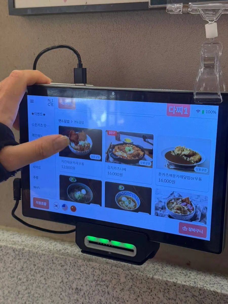 Tonkatsu menu photos displayed in the restaurant