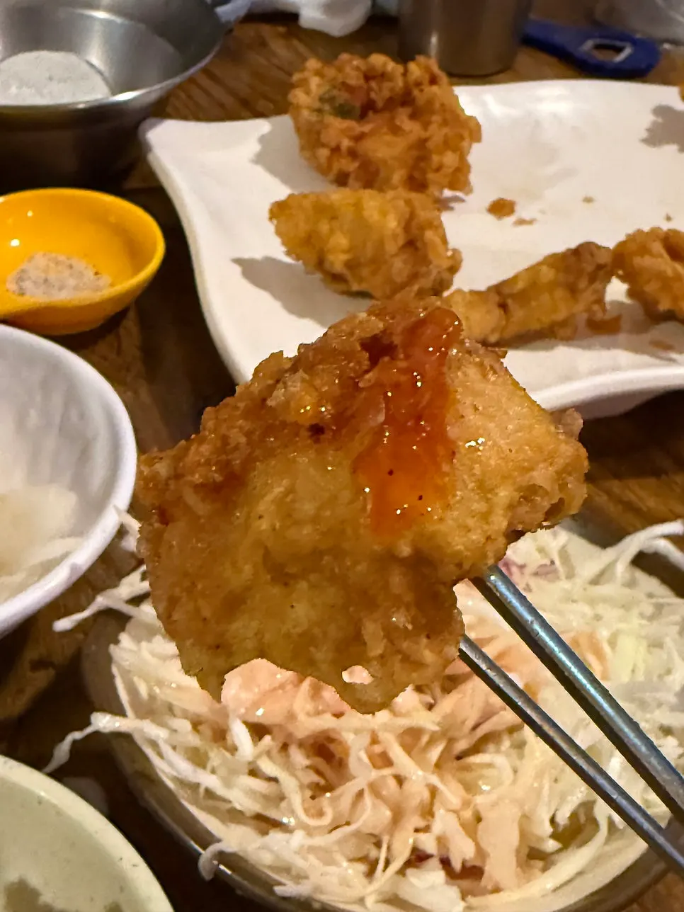 Close-up of the thin, crispy batter on the fried chicken