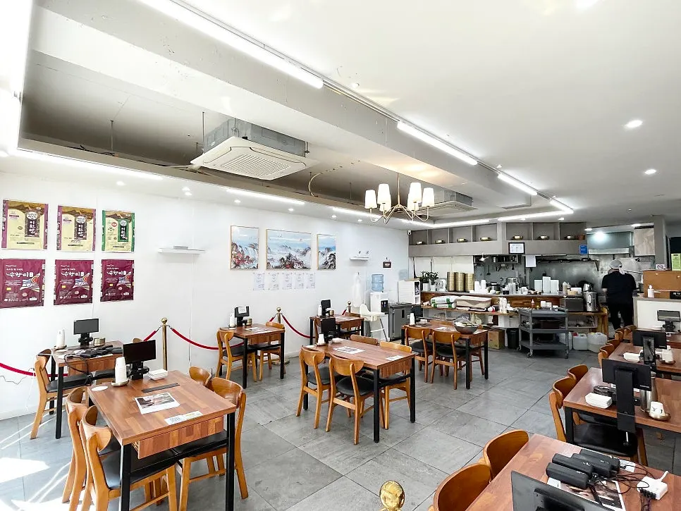 Neatly arranged seating inside Sinseon Myeonga