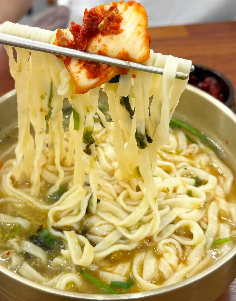 Kalguksu served with self-serve kimchi