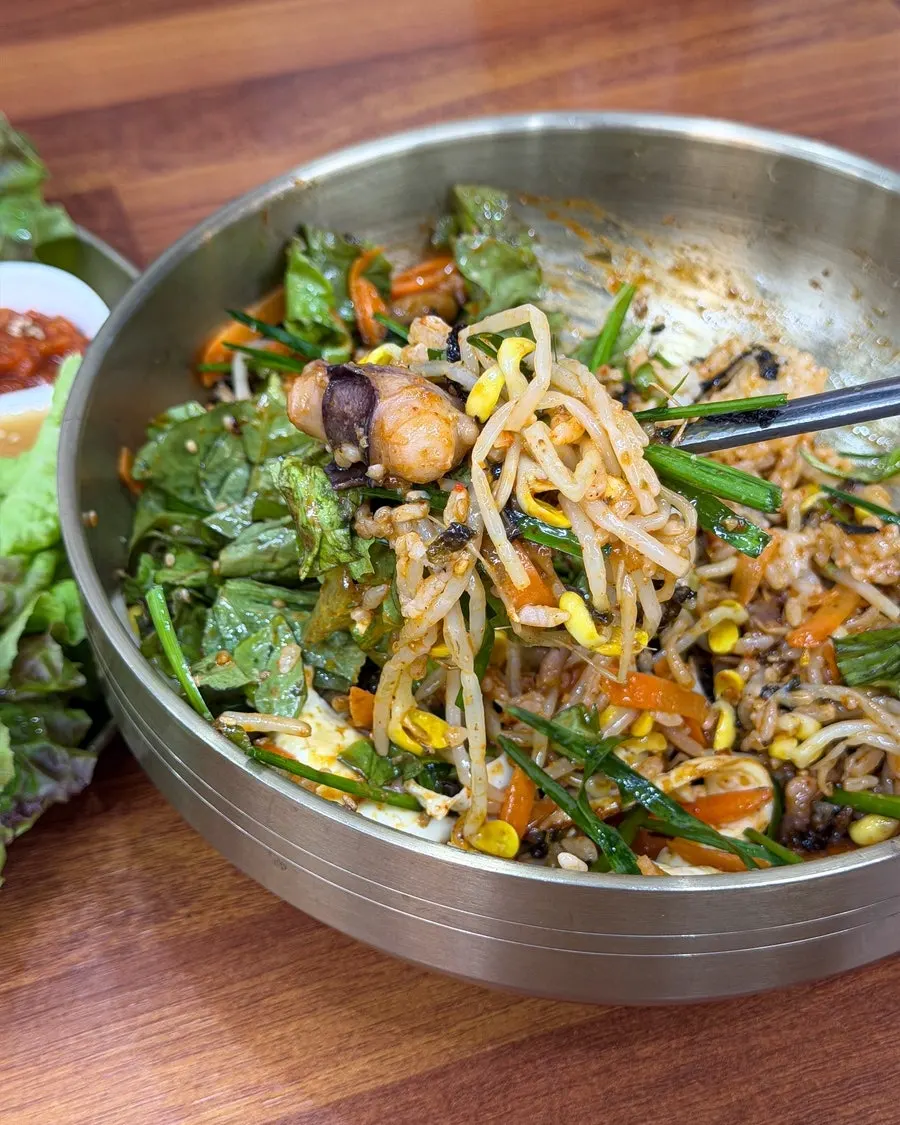 Bibimbap showing substantial octopus and vegetables