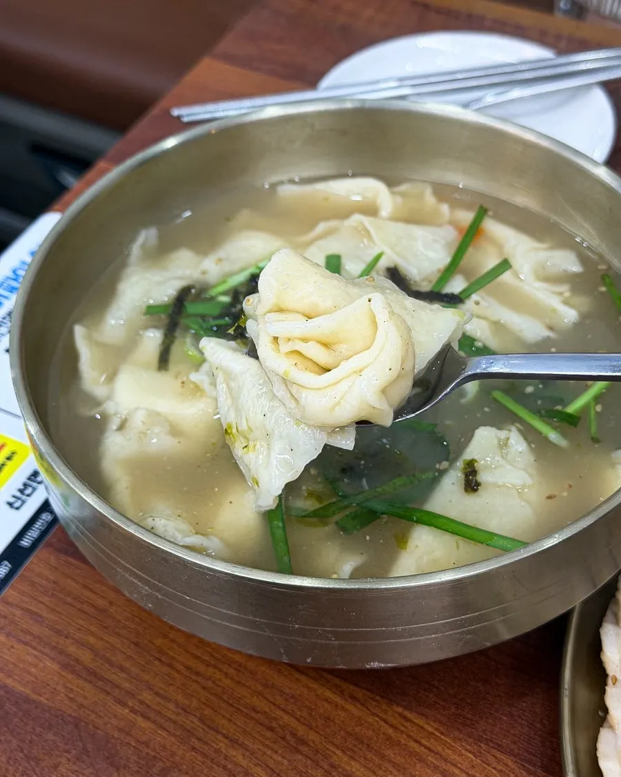 Close-up of sujebi dough in the broth