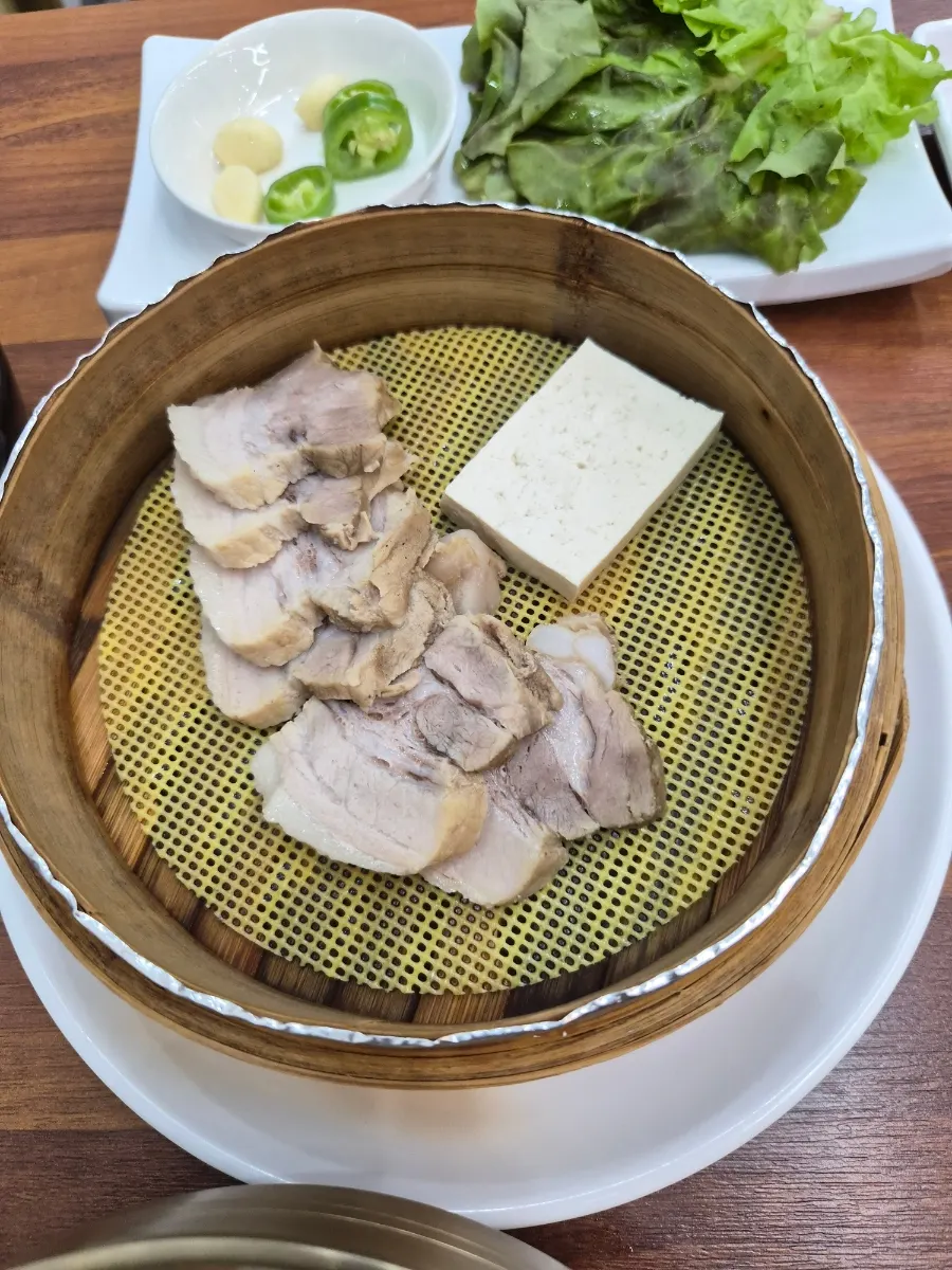 Kalguksu in broth made with dried big-eye herring and soup anchovies