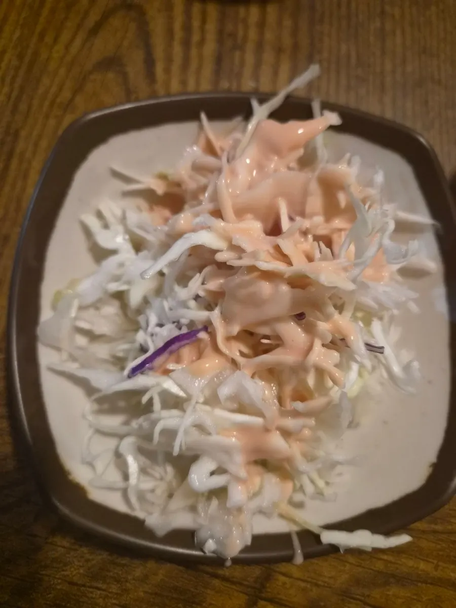 Basic side dishes: cabbage salad, pickled radish, and shrimp chips