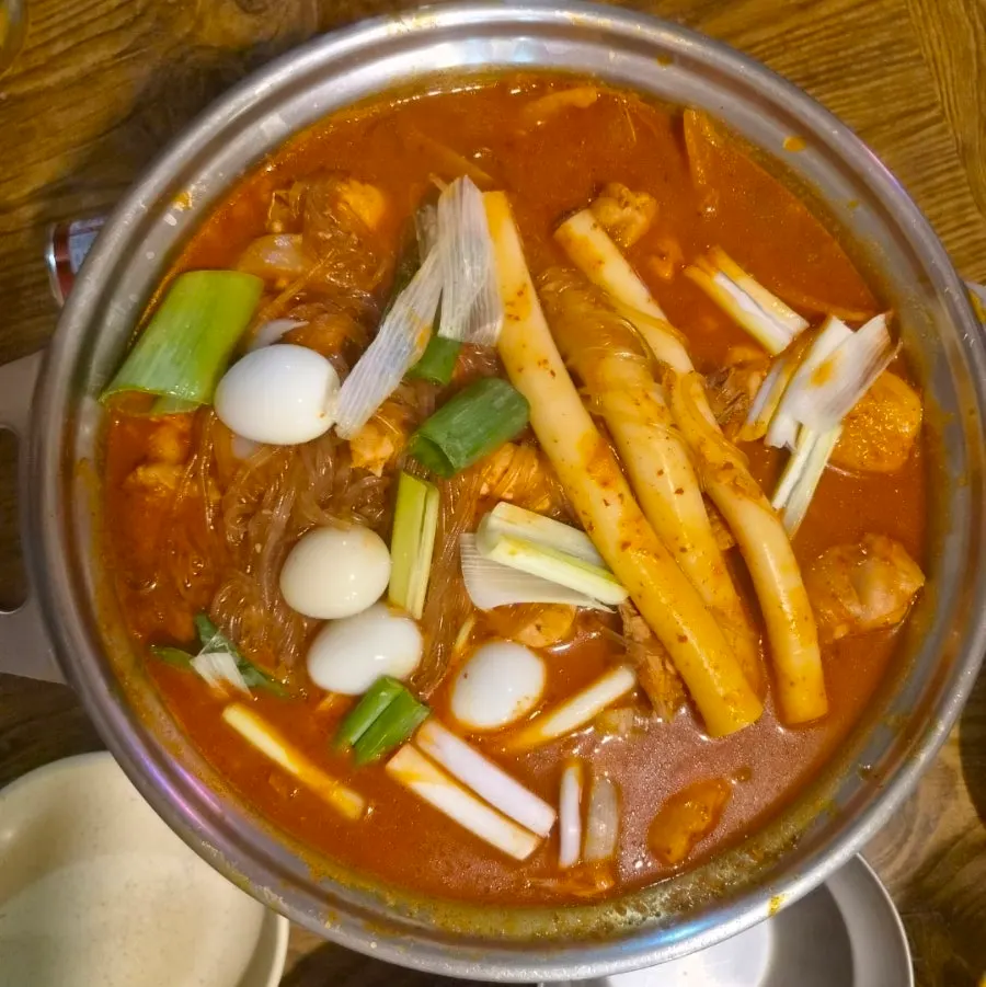 Dakdoritang with milk-flour rice cakes, glass noodles, and quail eggs