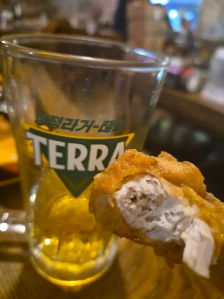 Fried chicken and cold beer, a full chicken-and-beer spread