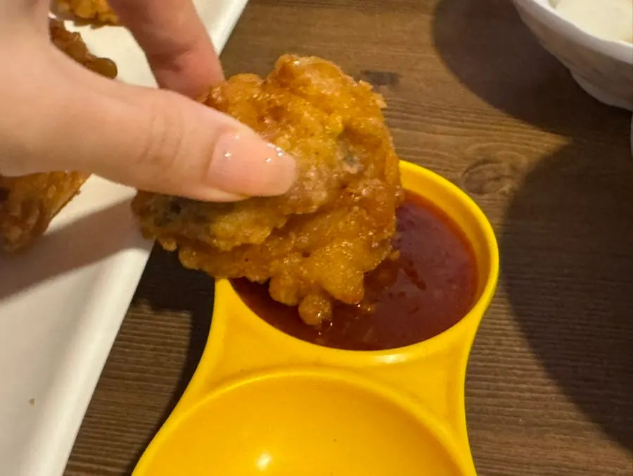 Old-style fried chicken served with seasoning sauce and salt