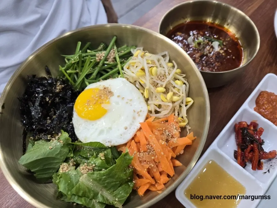 Octopus bibimbap topped with a fried egg