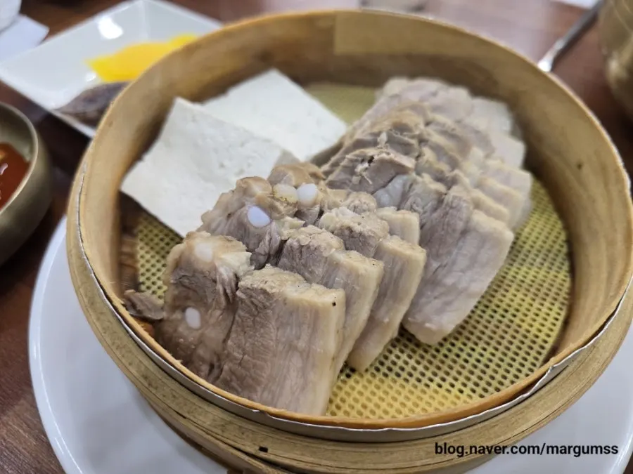 Plate of bossam served with tofu
