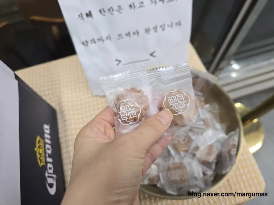 A glass of sikhye and yakgwa taken for dessert