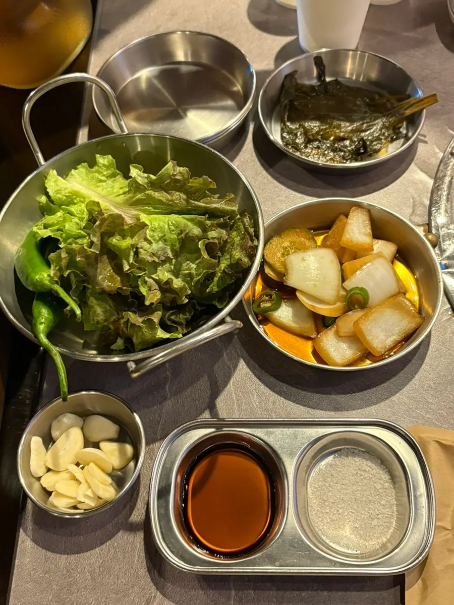 A neatly arranged spread of side dishes