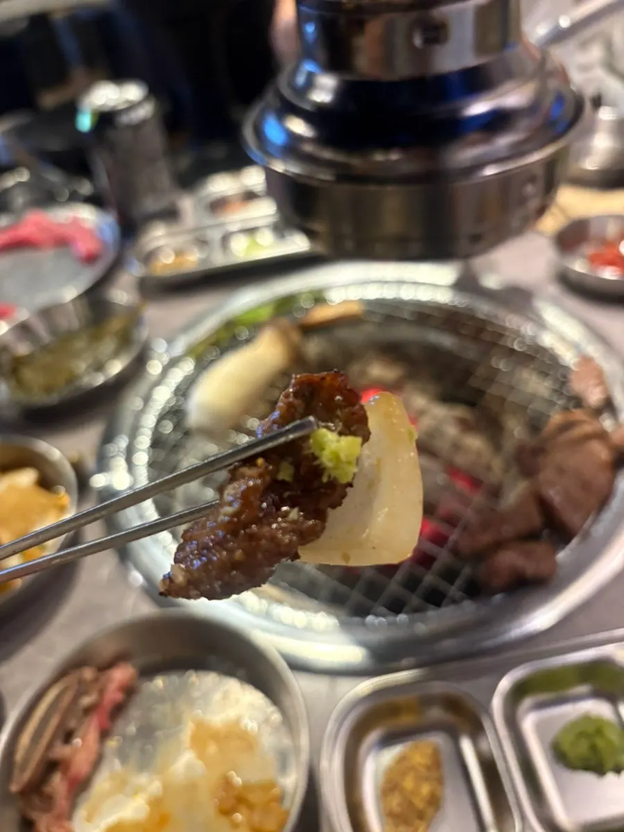 Pulling apart LA flower galbisal with chopsticks