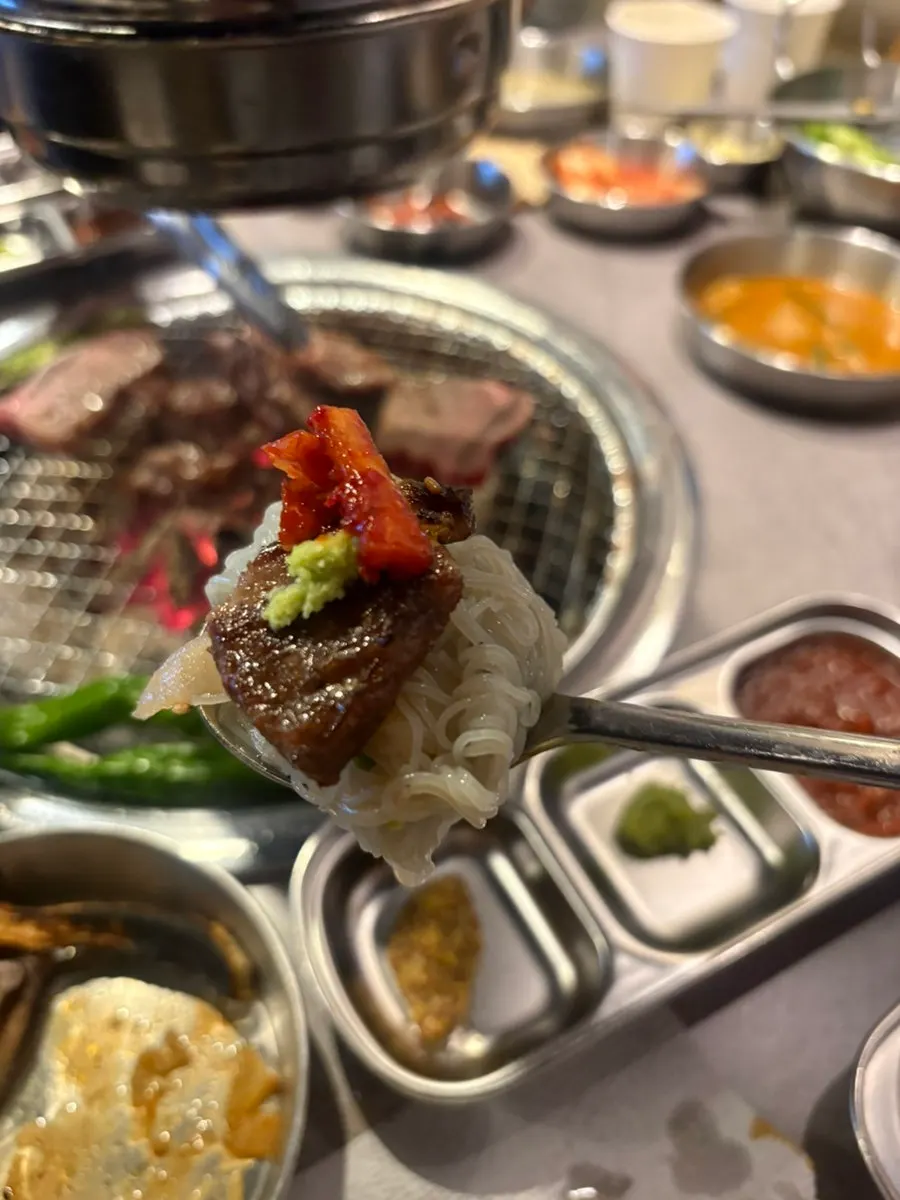 Beef galbisal eaten together with pickled onions