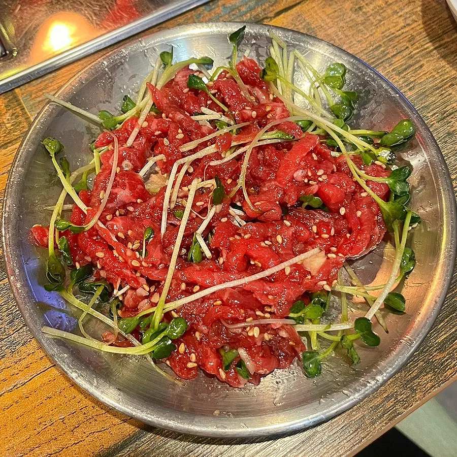 Hanwoo raw sirloin served on a large plate