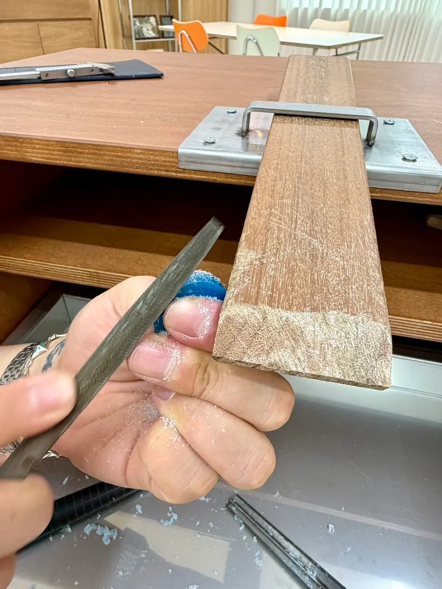 Sanding the thickness of a wax ring during the experience