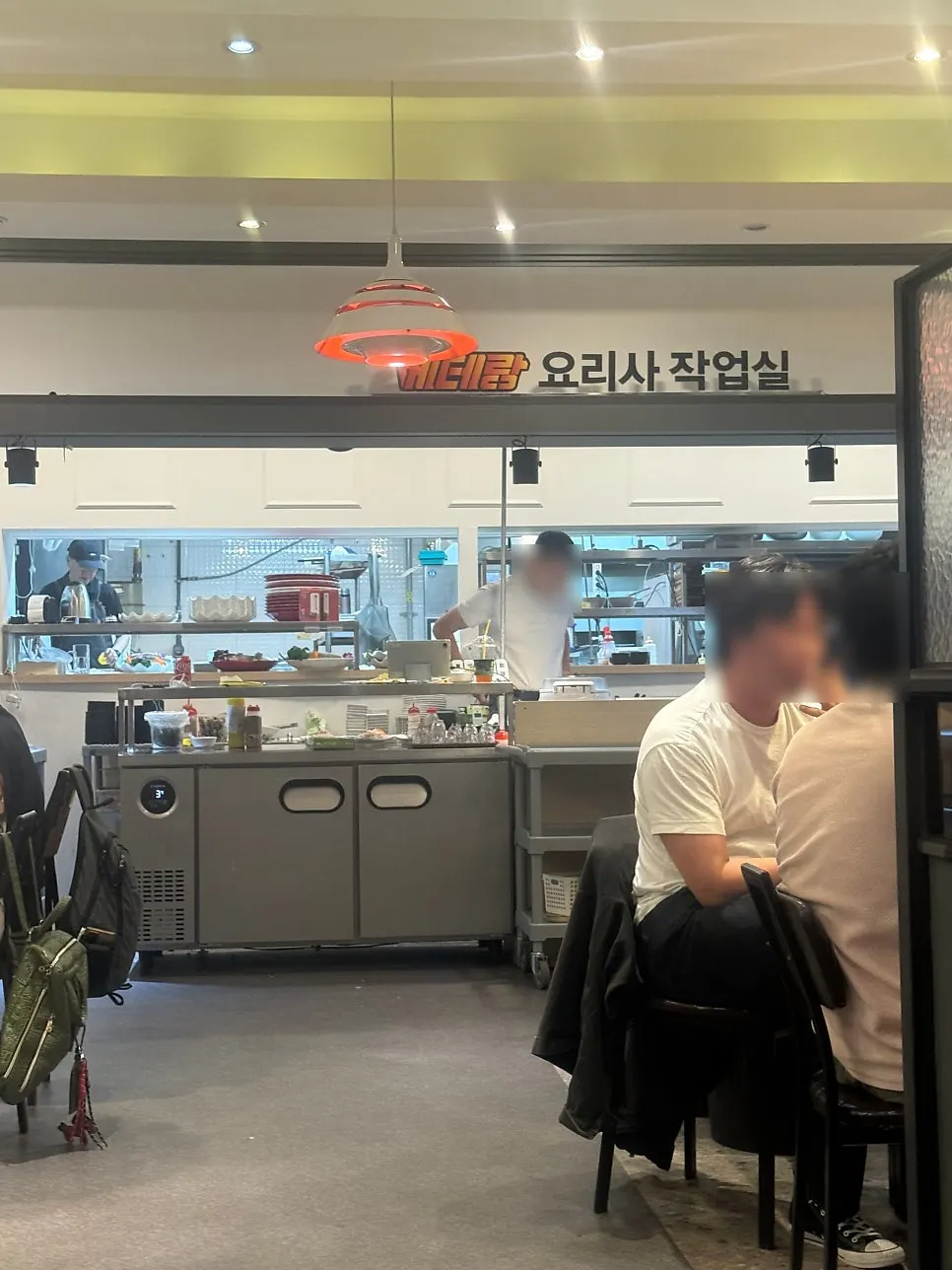 Open kitchen where sashimi is being prepared