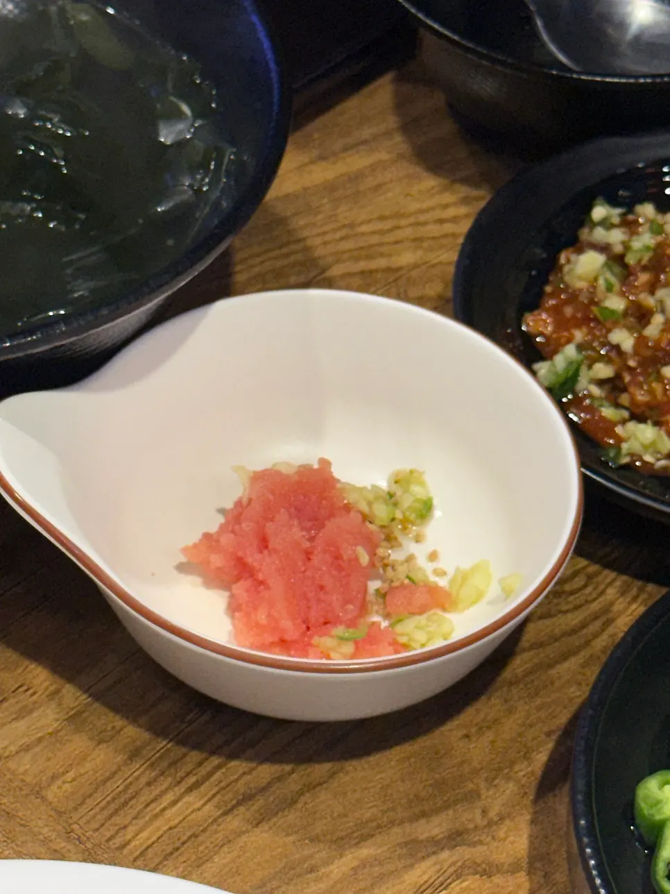 Spicy-tangy sashimi salad served as a basic side dish
