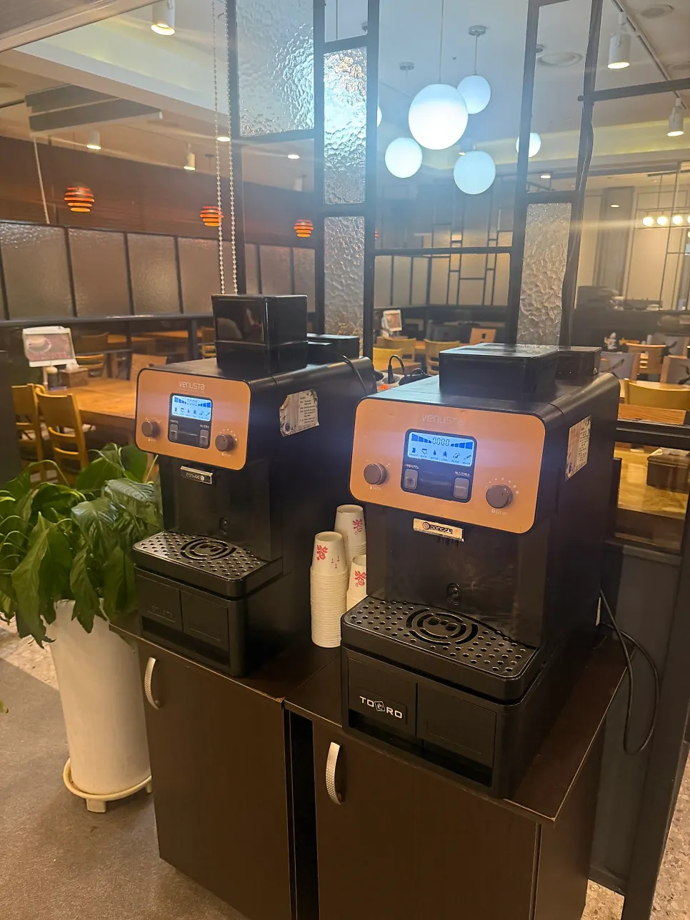 Hot coffee machine in the dessert corner