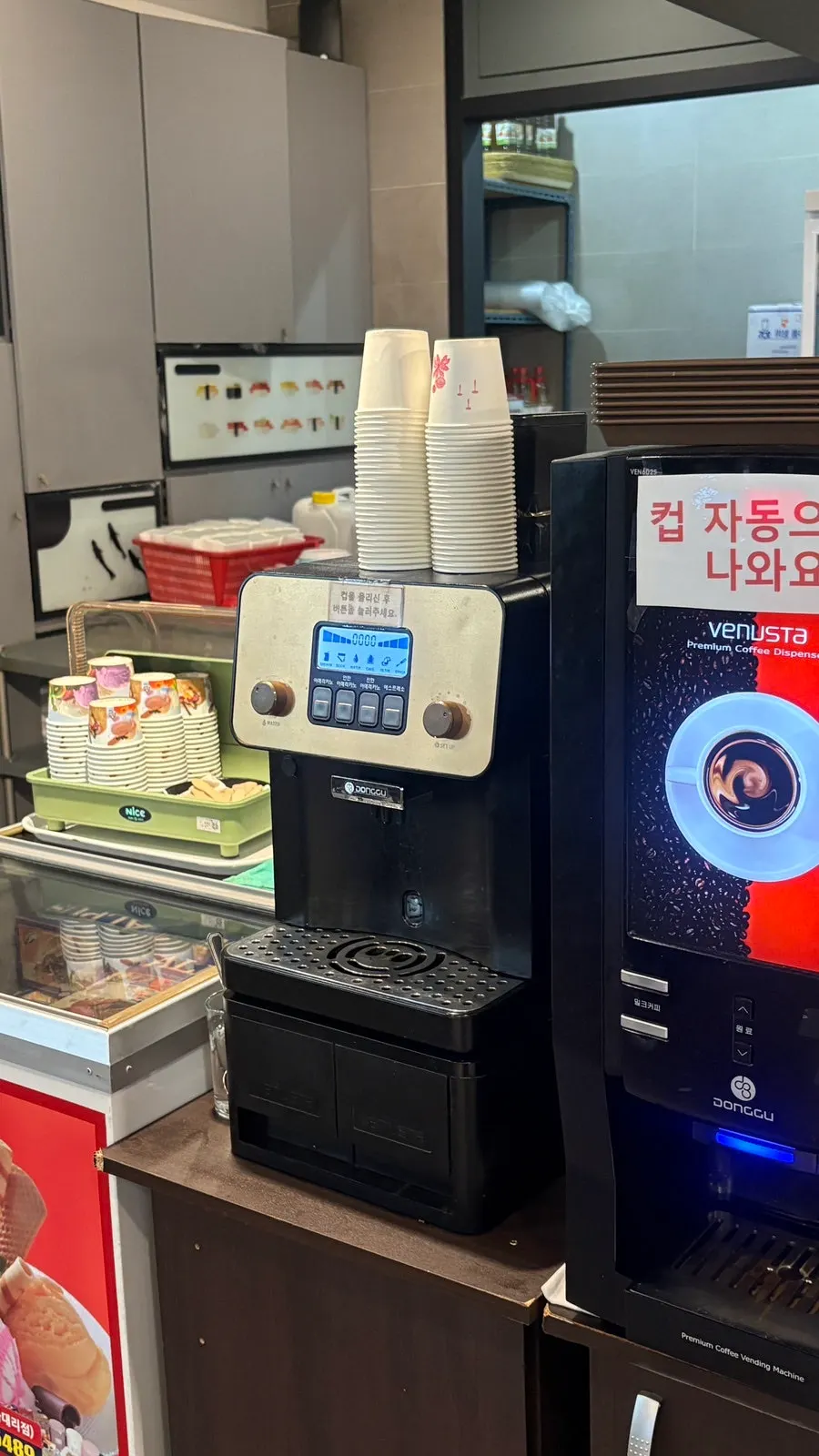 Dessert corner with tricolor ice cream and coffee machine