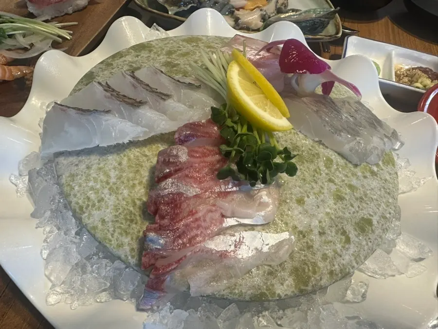 Sashimi and side dishes laid out together