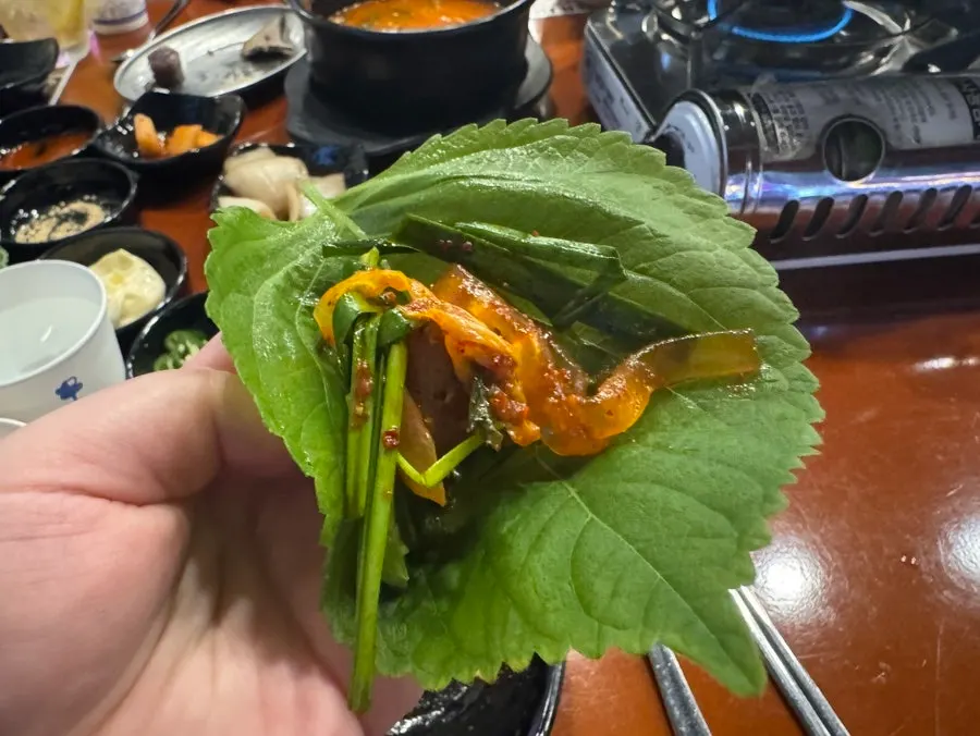 Seasoned gopchang with glass noodles and rice cakes