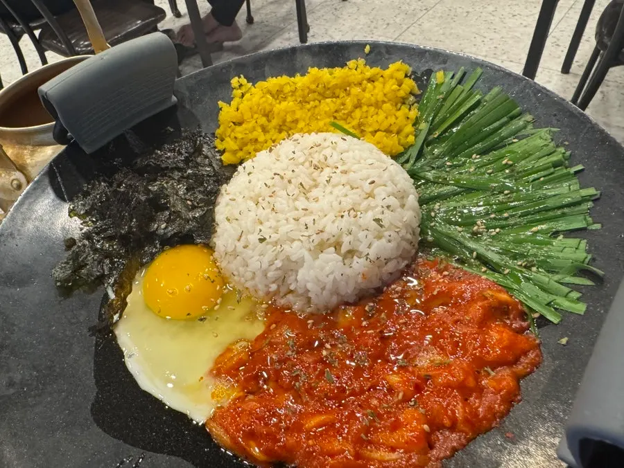 Gopchang and side vegetables on the grill