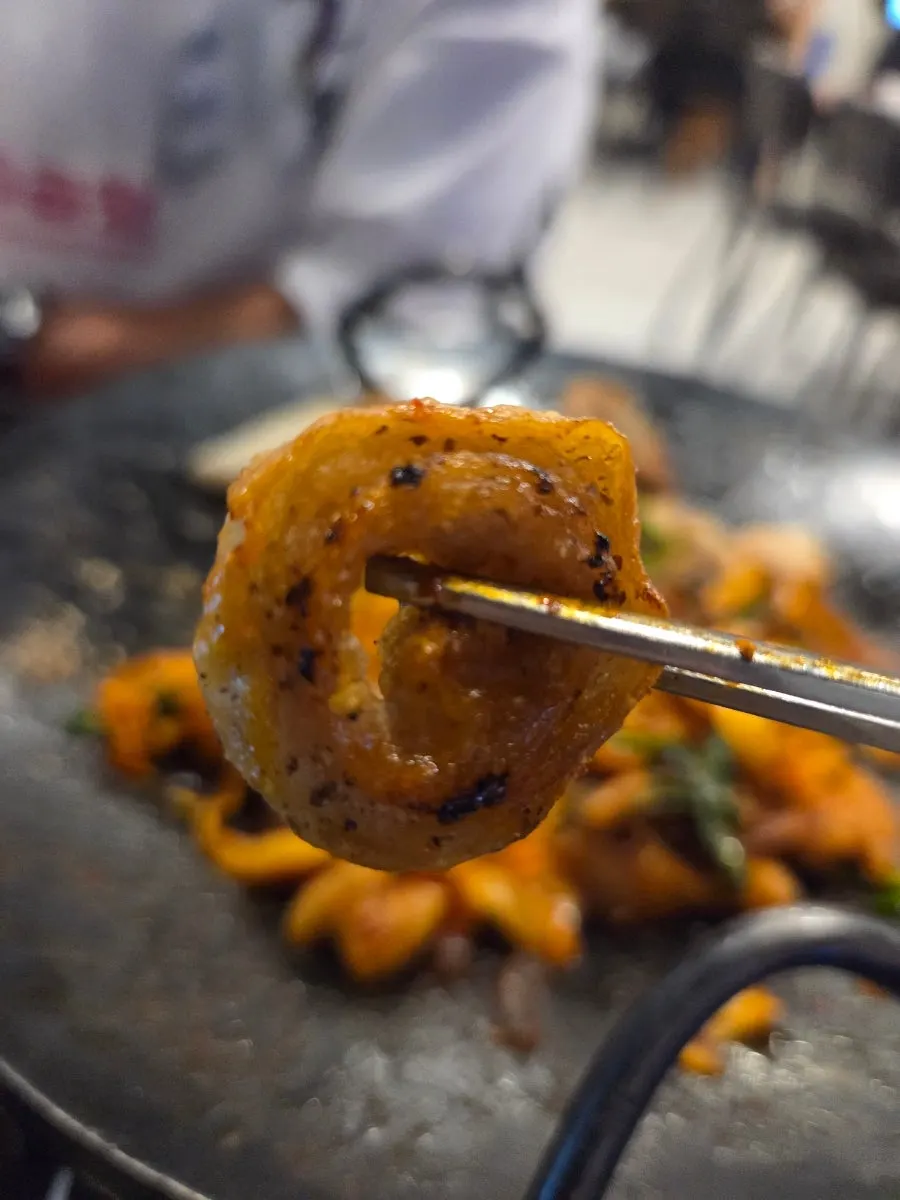 Stir-fried vegetable gopchang wrapped in perilla leaves