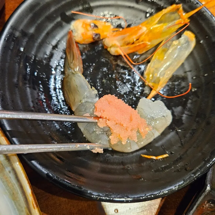Grilled shrimp head packed with tomalley