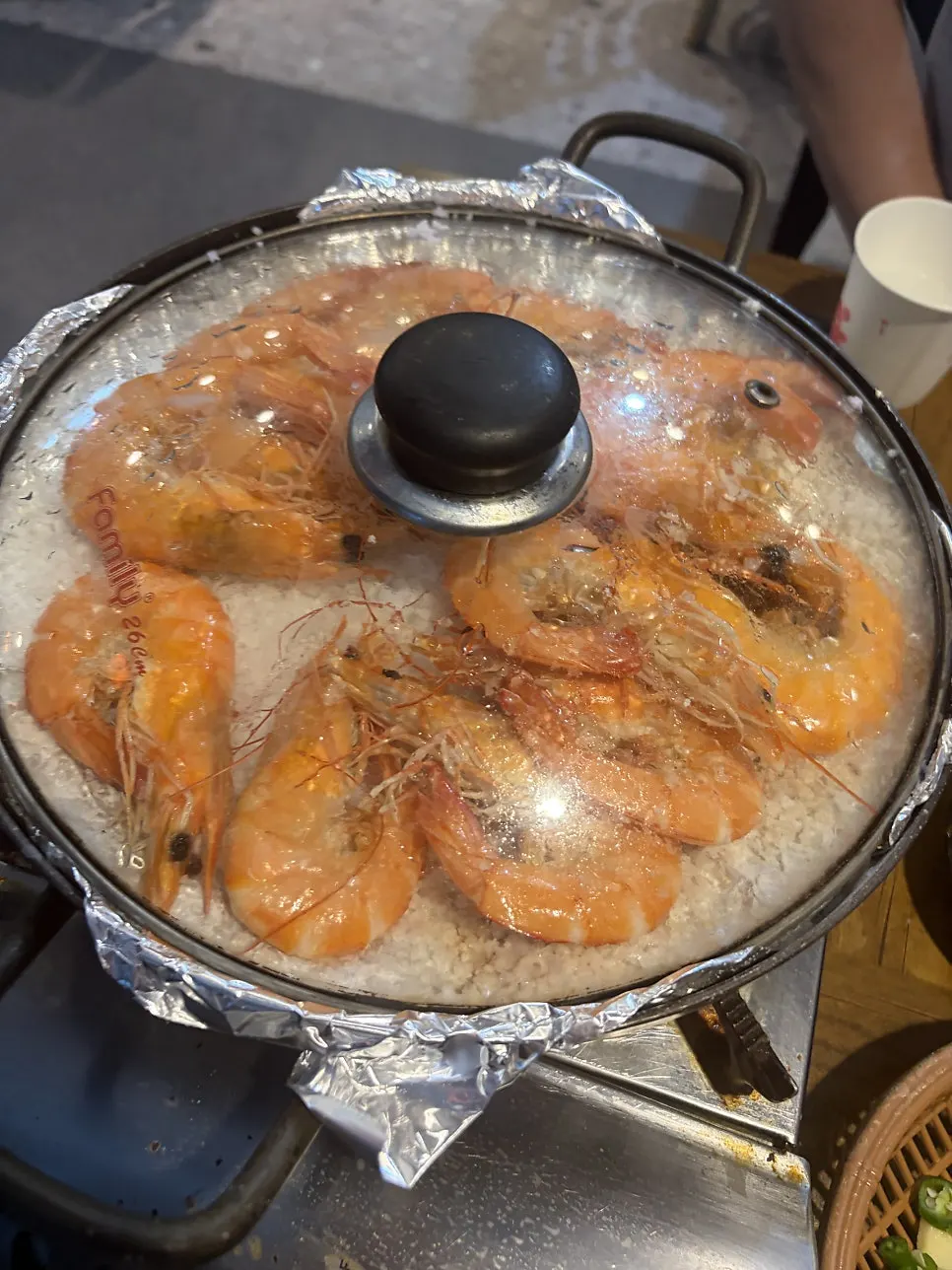 Shrimp turning red on the hot salt plate