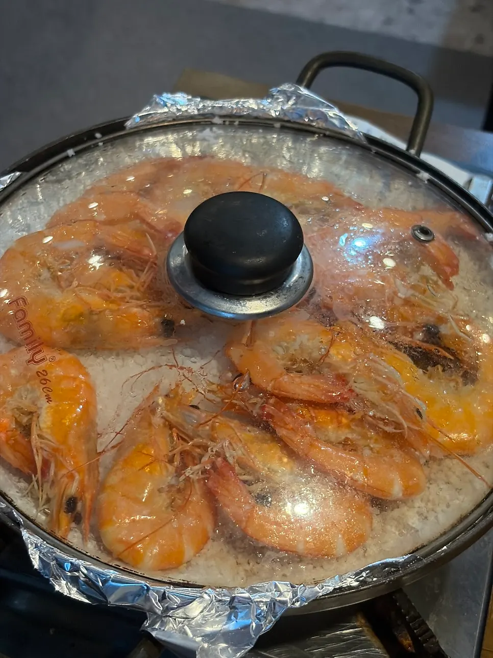 A plump raw shrimp grilled with salt