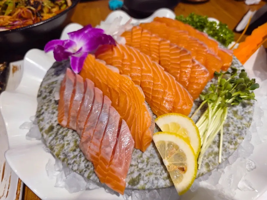Raw-fish salad and a spread of side dishes